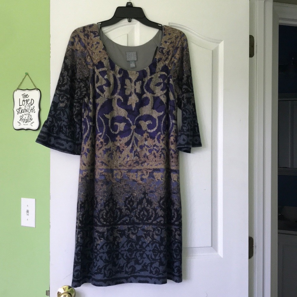 Fully lined dress ruffled 3/4 sleeves very soft